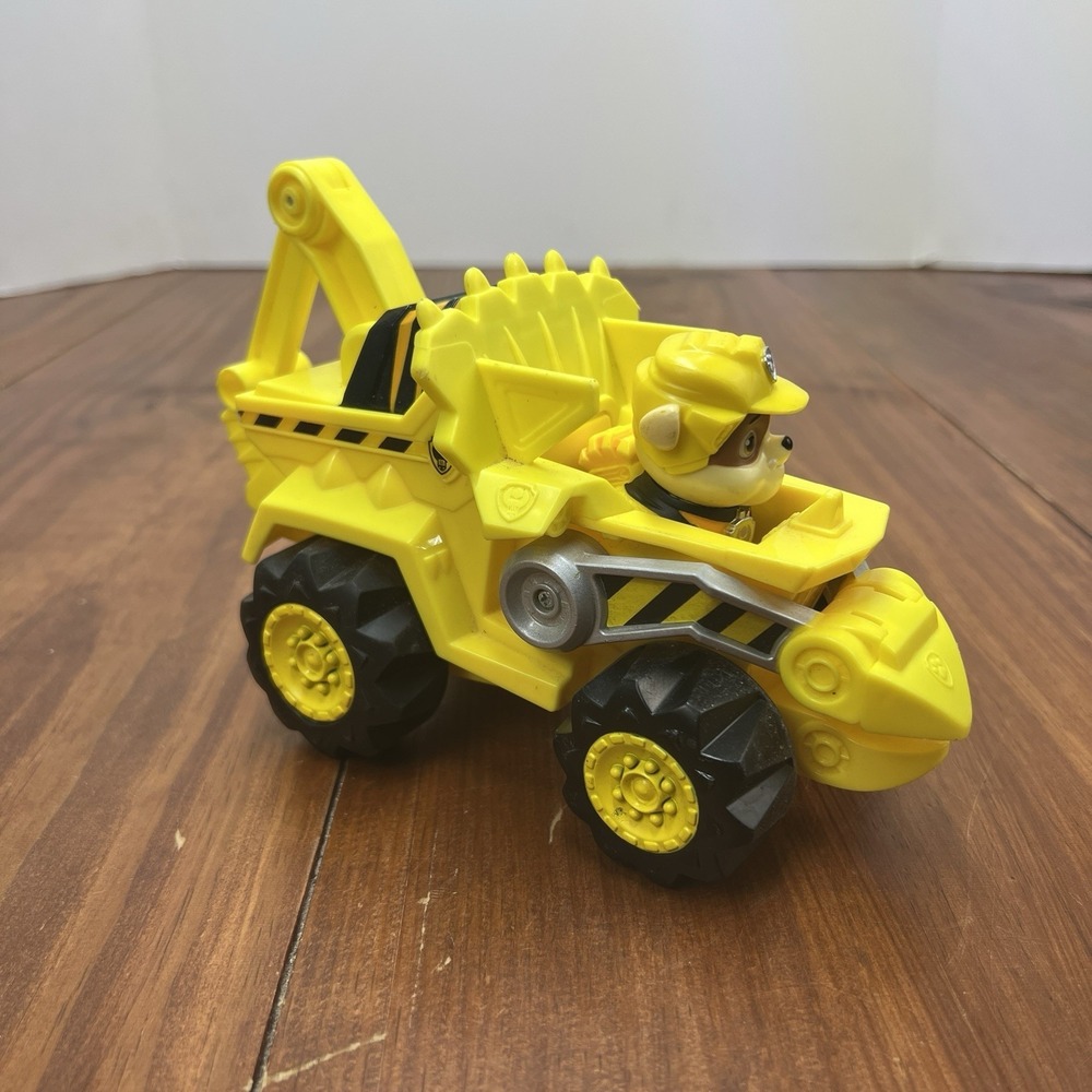 PAW Patrol Dino Rescue Rubble Deluxe Vehicle Truck w Figure Spin Master